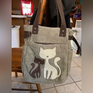 To all you cat lovers out there here’s a burlap cat shoulder bag